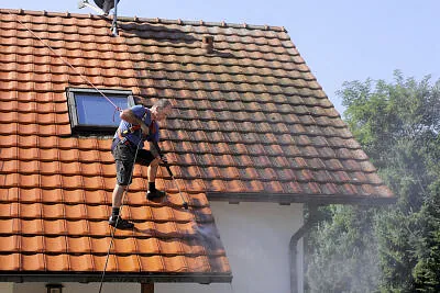 Man flushing outdoor roof